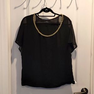 Black short sleeve blouse with gold chain neckline